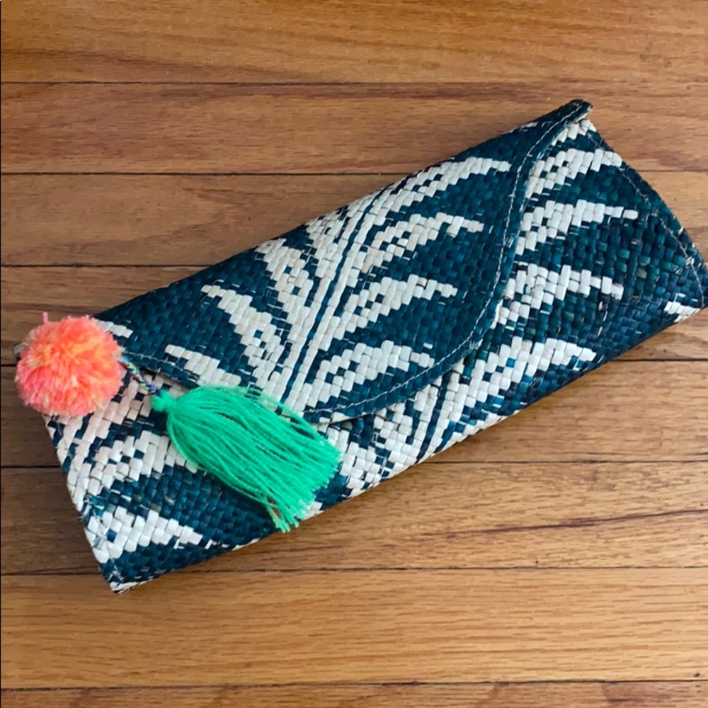 Banago woven palm clutch